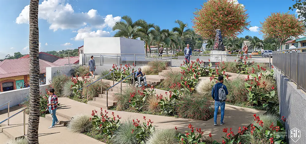 Aménagement paysager d’une place publique avec escaliers végétalisés et jardins en terrasses réalisé par un architecte paysagiste à Saint-Esprit en Martinique.